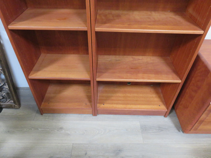 Cherry Veneer Bookcase on Right