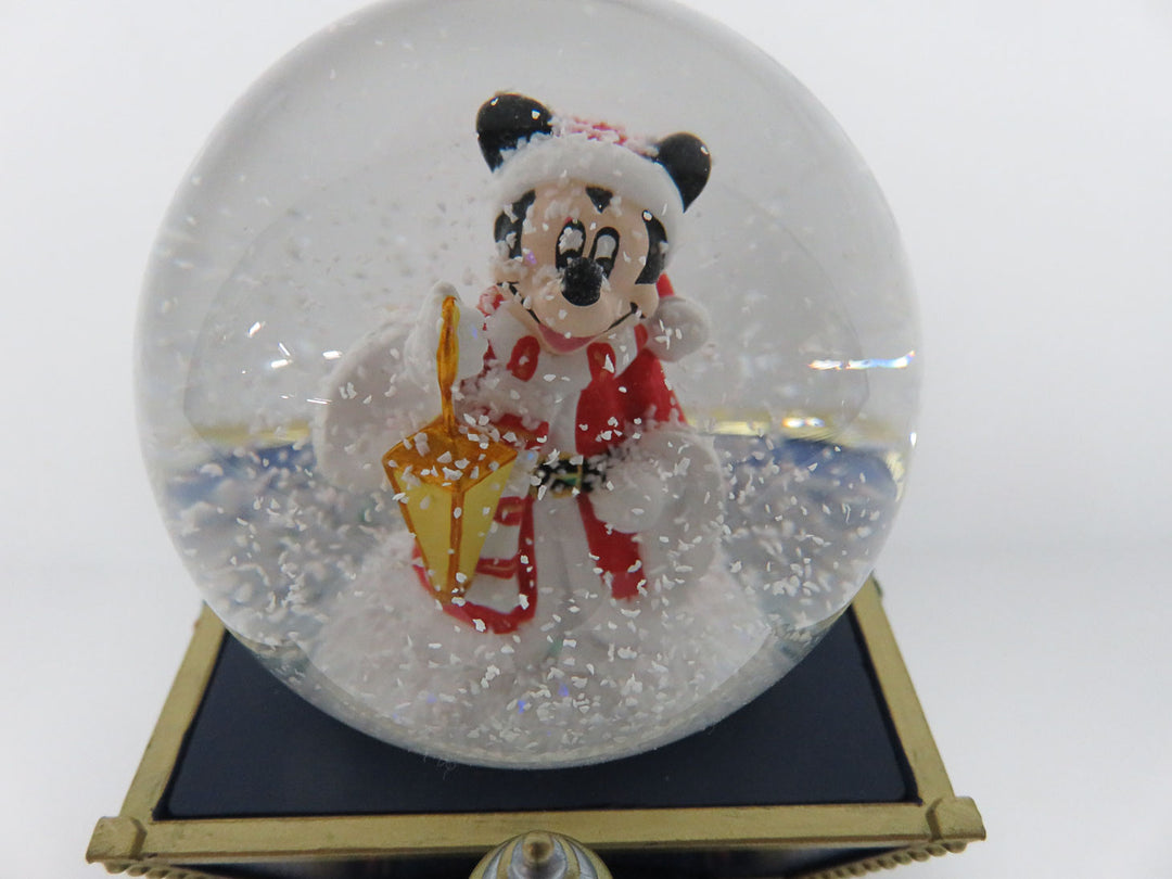 Mickey Mouse in snow globe on train music box