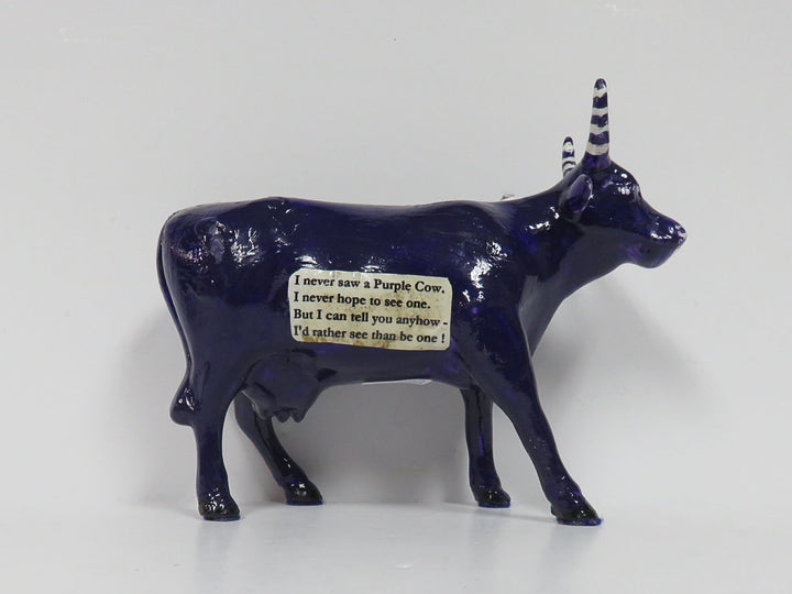 Whimsical Cow Figurine
