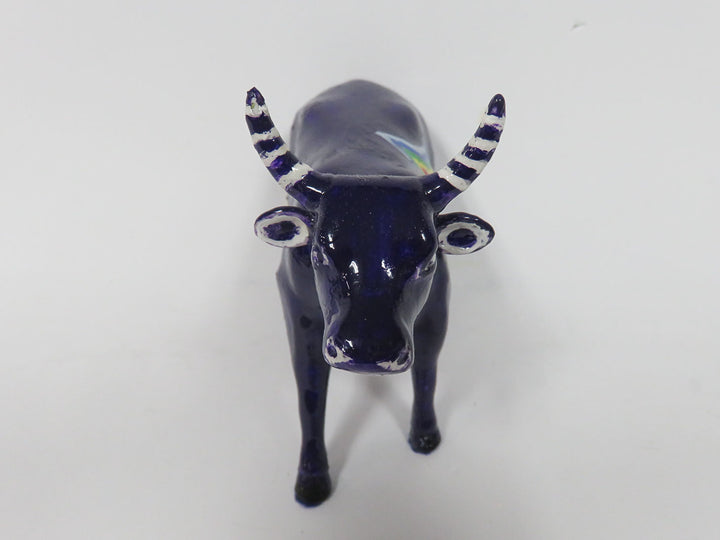 Whimsical Cow Figurine