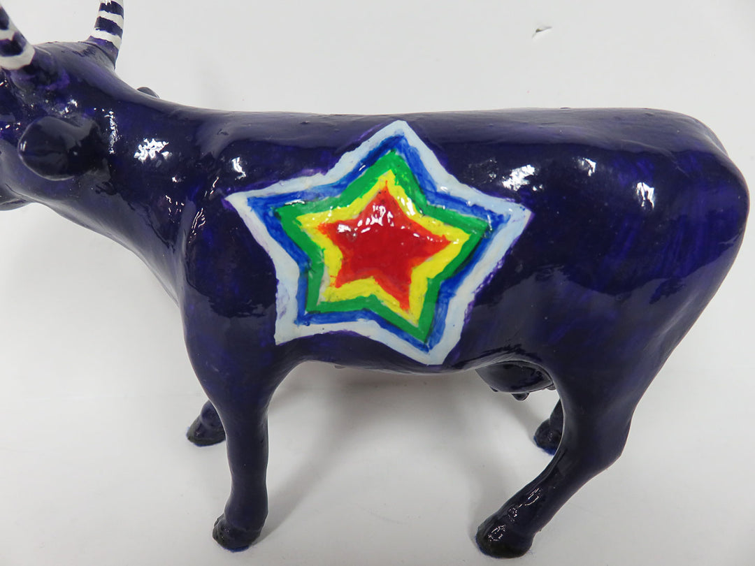 Whimsical Cow Figurine