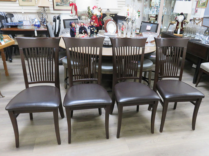 Four Canadel Dining Chairs