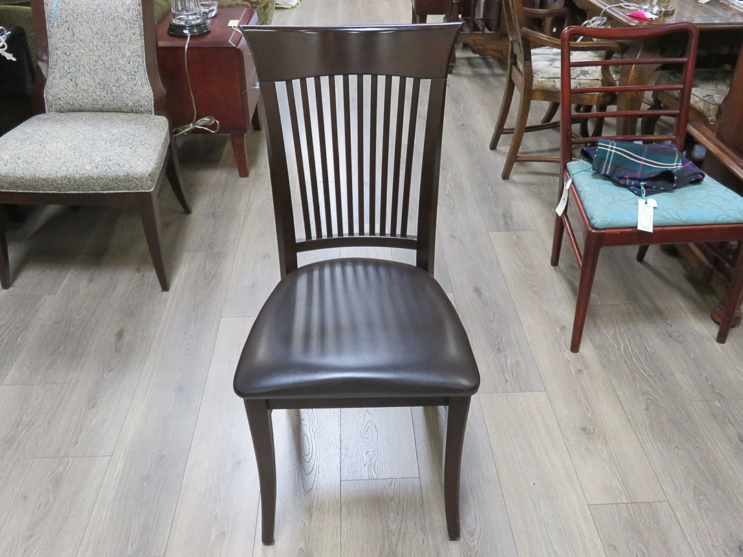 Four Canadel Dining Chairs