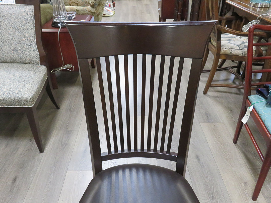 Four Canadel Dining Chairs