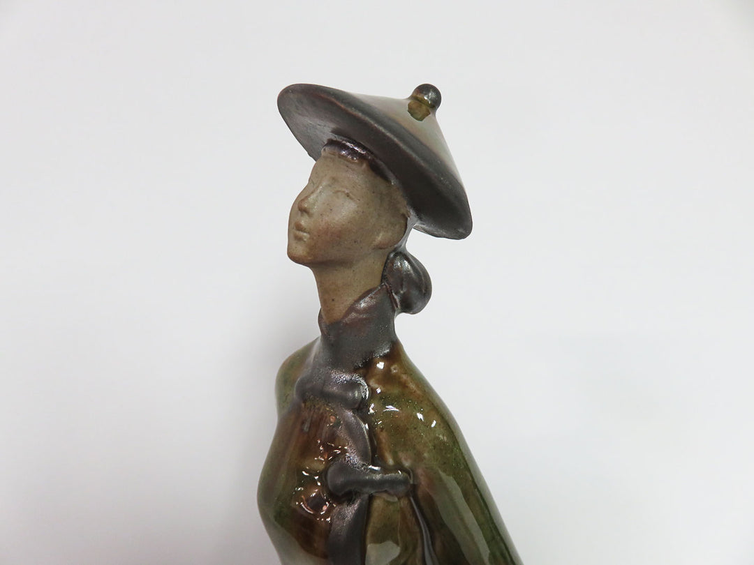 Tall Asian Sculptural Figurine