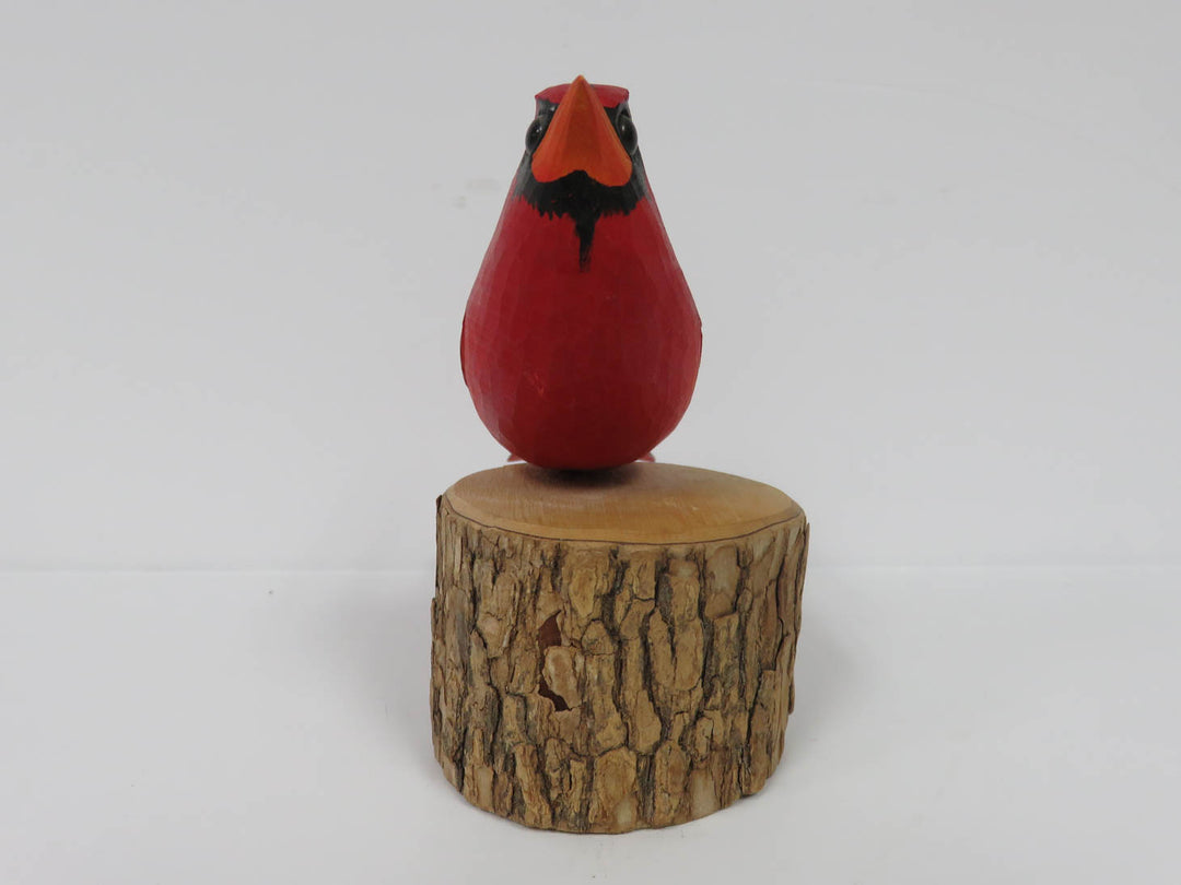 Carved Cardinal Figurine
