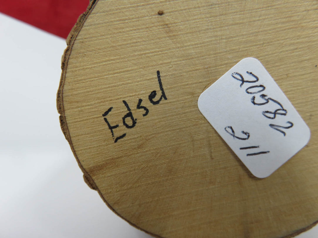 Carved Cardinal Figurine