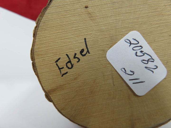 Carved Cardinal Figurine