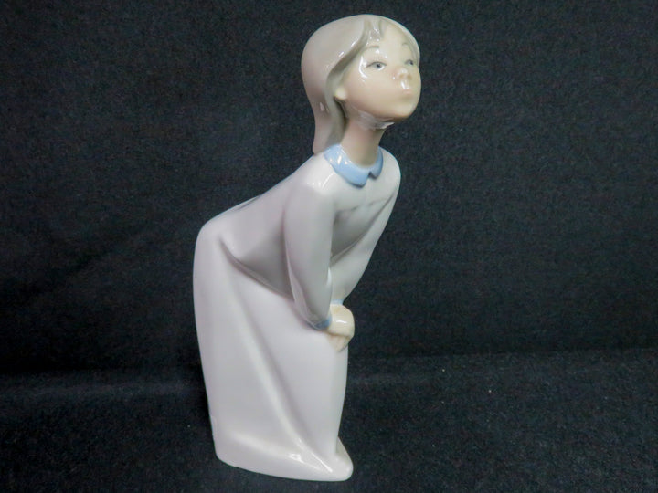 Lladró Girl Kissing Figurine