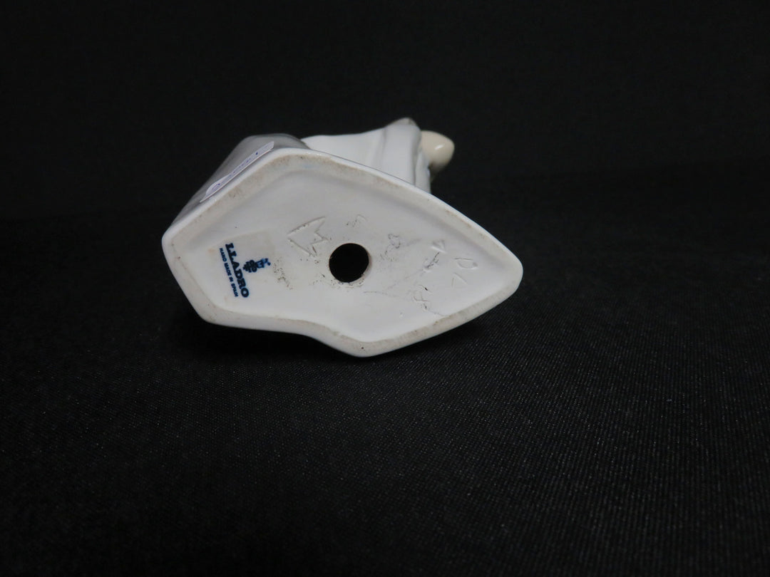 Lladró Girl Kissing Figurine