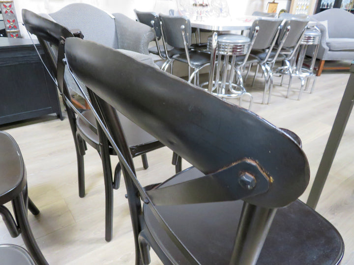 Four Black Metal Chairs