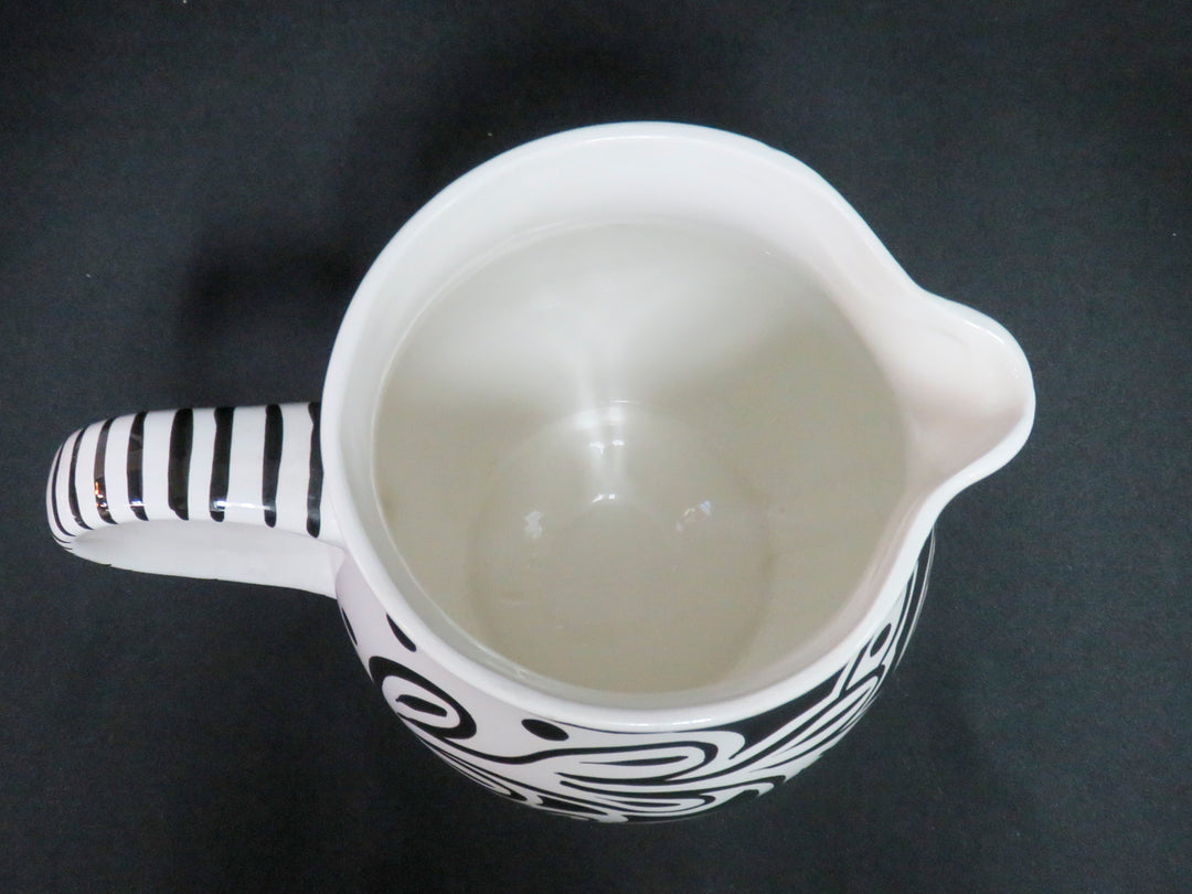 M. B. Wright Pitcher